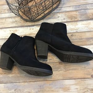 Black booties with side zipper and 2-3” heels.